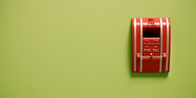 Fire safety technician inspecting equipment